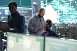 governmental hackers working computer network high tech office scaled