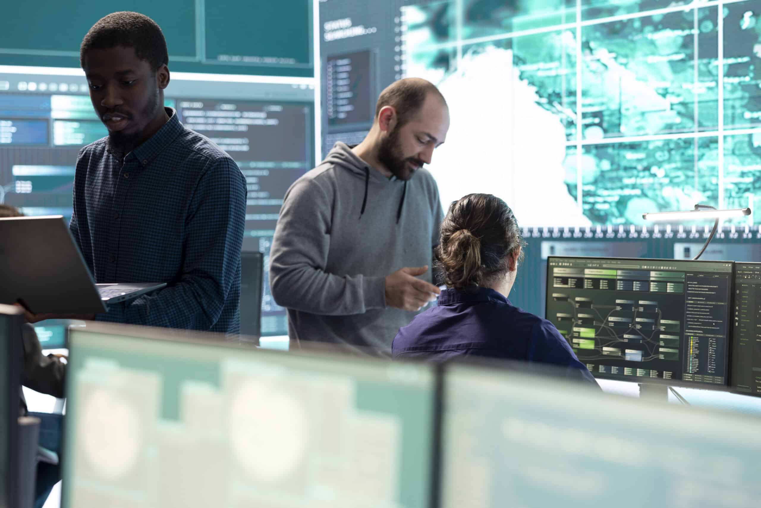 governmental hackers working computer network high tech office scaled